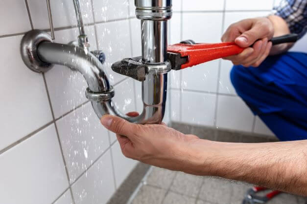 A sink being repaired